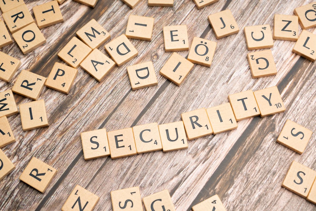 SaaS audit log implementation enterprise — security word tiles representing the compliance-focused nature of enterprise audit logging