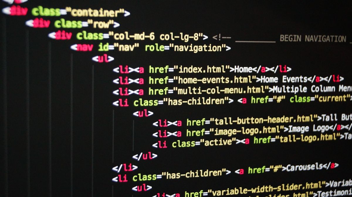 API versioning strategies for handling breaking changes in SaaS — programming code on a screen representing versioned API endpoints