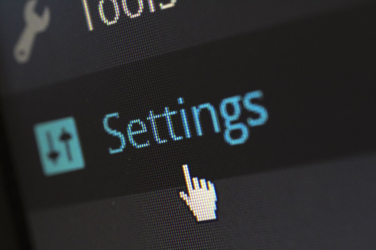 API key rate limiting and management — close-up of a computer screen showing the settings button with a cursor hovering over it
