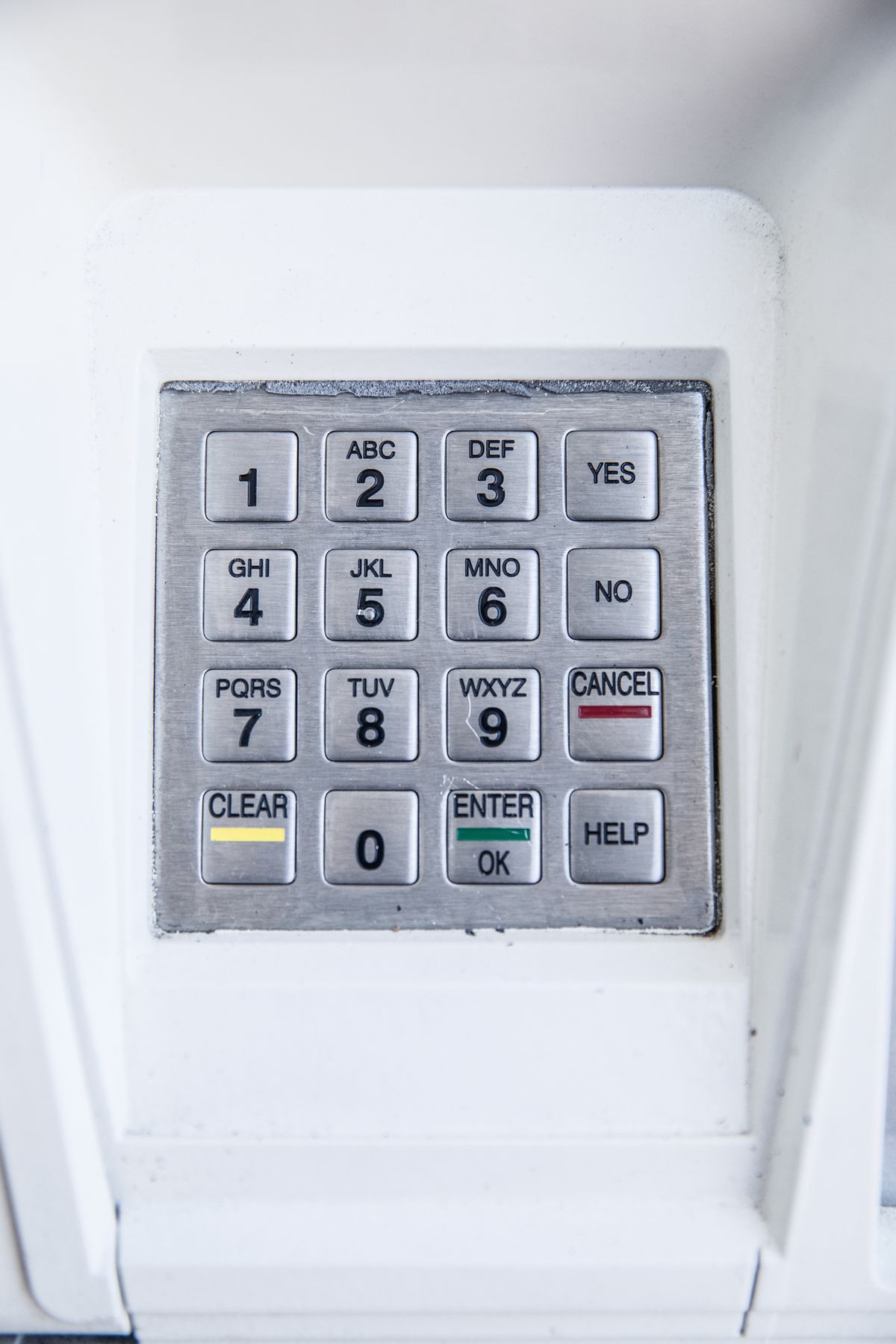 Cryptographically secure API key generation — close-up of an electronic keypad with numbers and letters