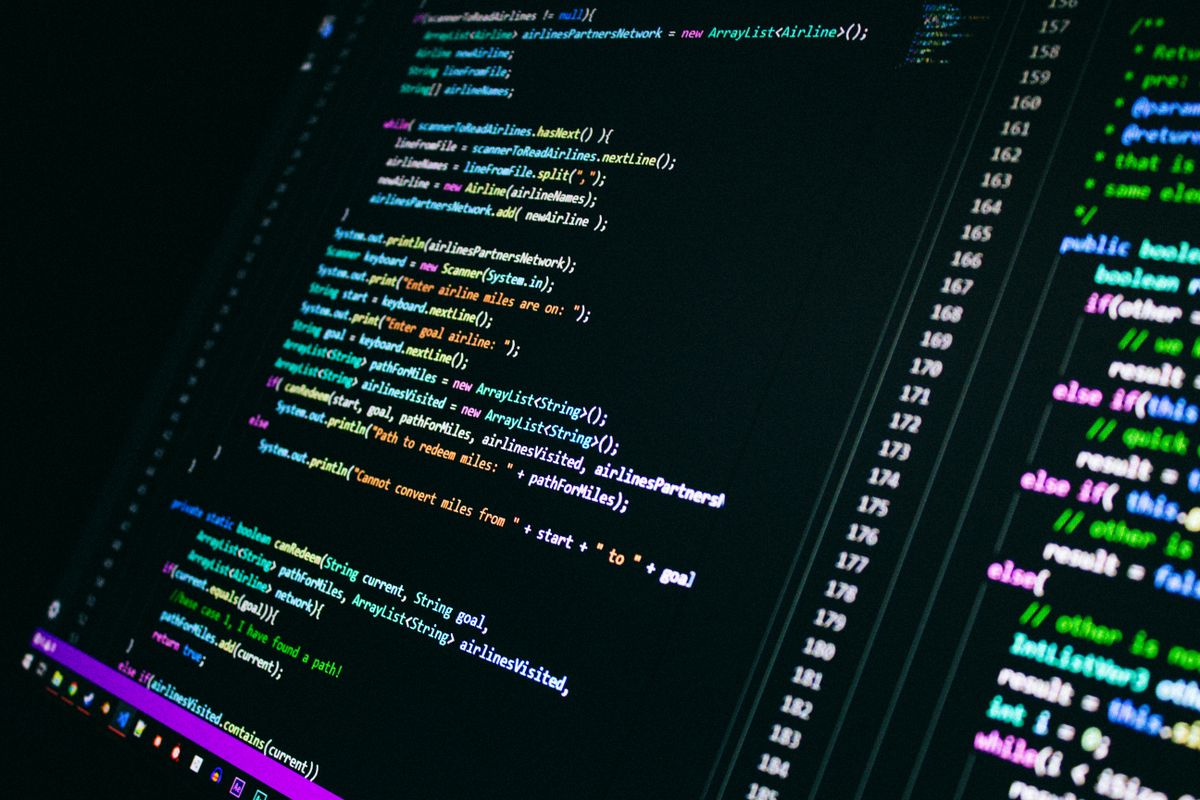 GitHub OAuth developer authentication — colorful programming code on a computer screen