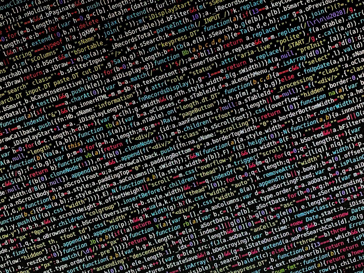 Colorful programming code on a screen representing Java monolith migration to modern NestJS stack