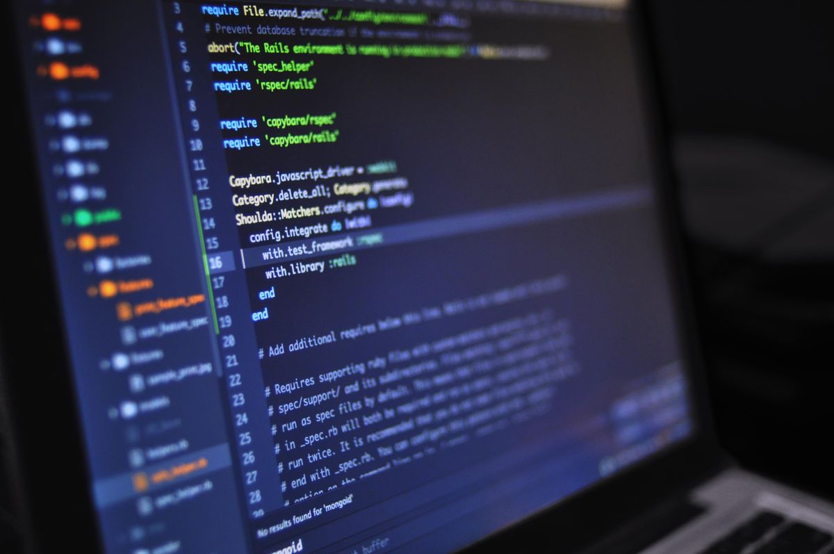 Programming code on a monitor representing HMAC-SHA256 signing in a webhook system backend