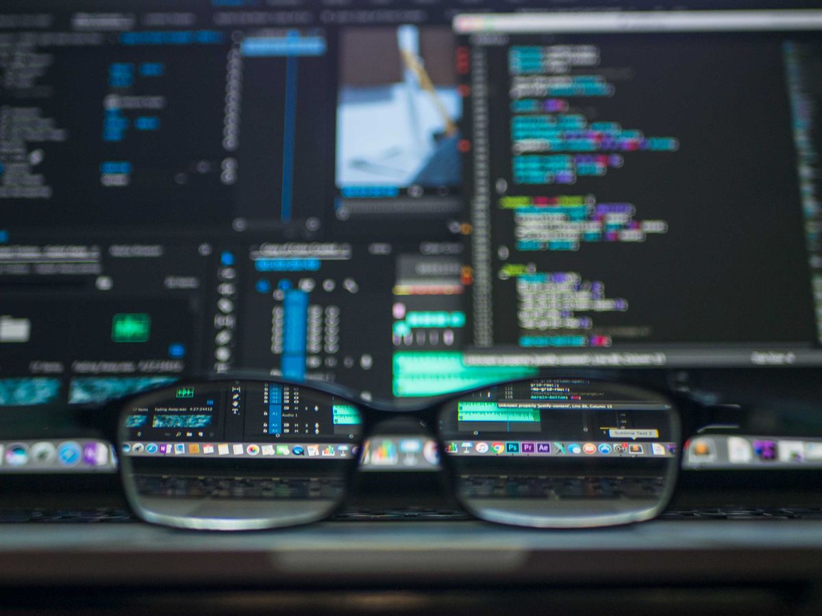 Implementing API versioning strategies in NestJS — code on a monitor showing version-specific controllers