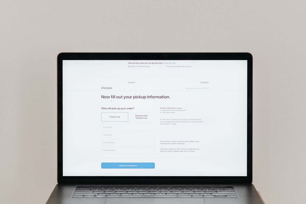 Stripe subscription billing implementation in NestJS — a laptop displaying an online checkout form representing the subscription checkout flow