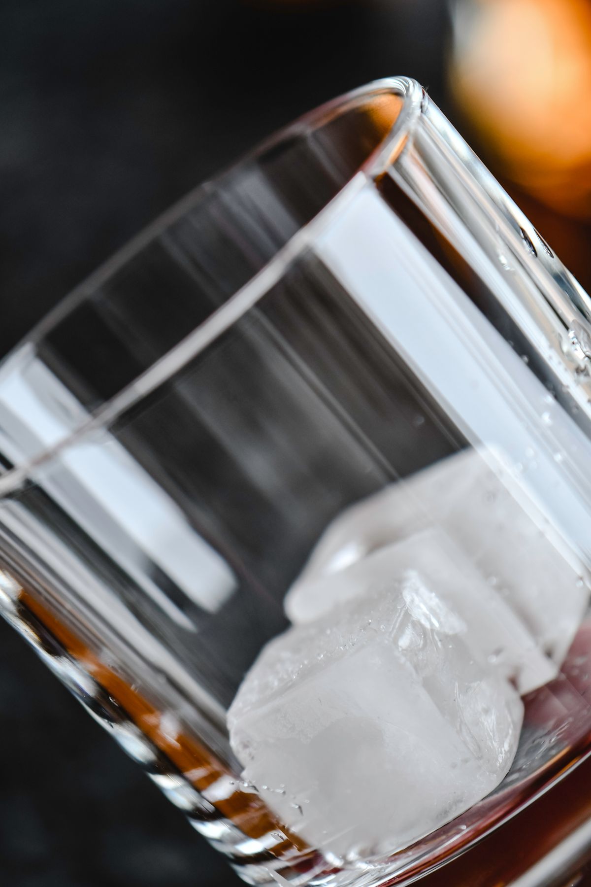Ice cubes in a glass, representing a serverless function frozen the moment a request finishes