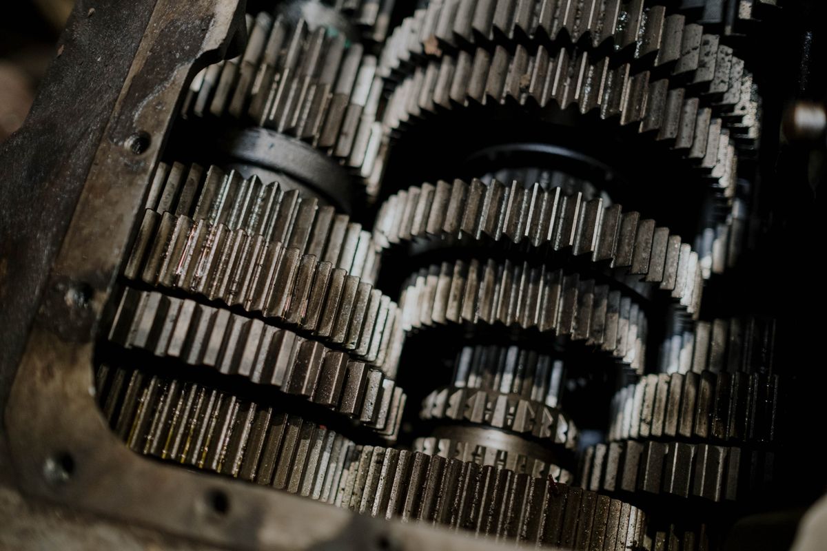 Under the simple UI sits real machinery — the gears the user never sees