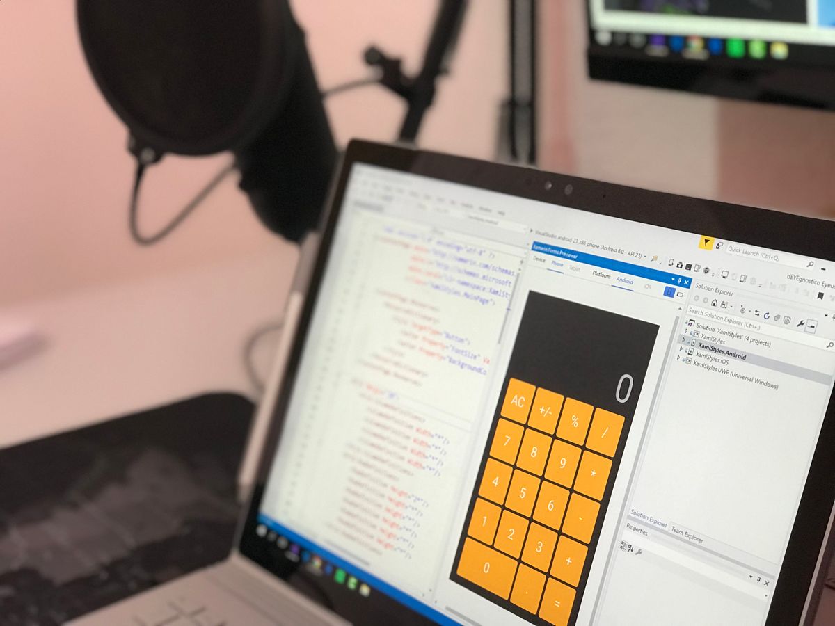 Fixing REST API design mistakes in SaaS — developer workspace with code and API documentation